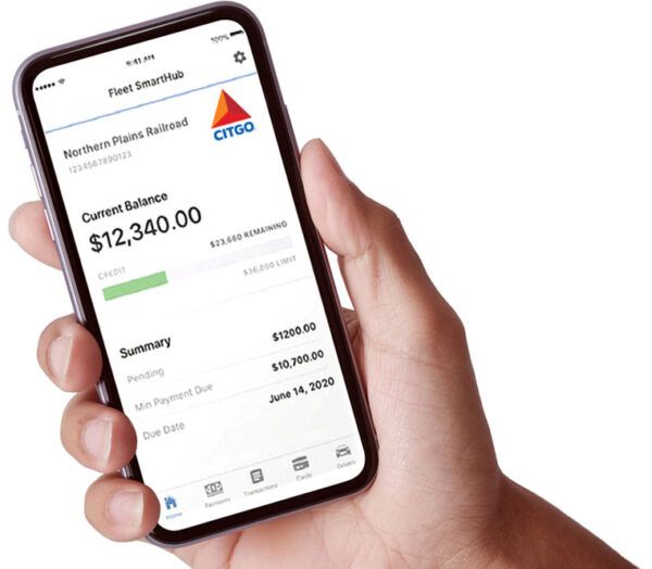 Hand holding mobile phone with Fleet SmartHub app