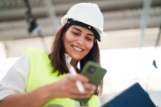 A fleet manager tracks fuel usage of drivers from her mobile fleet card app.